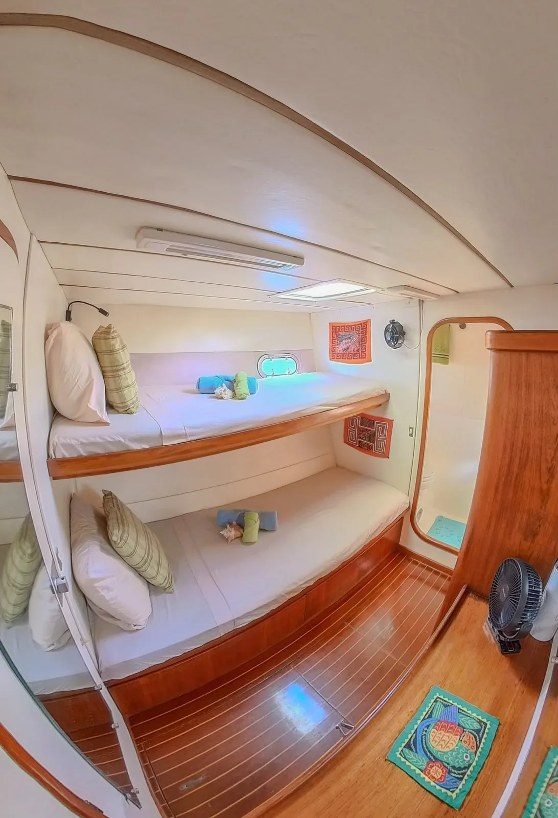 The fourth cabin on the Lagoon 55, fitted with two side berths and a cabin fan