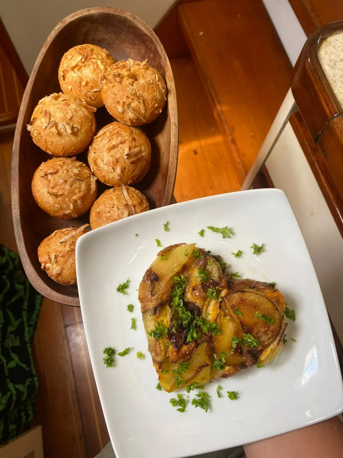 Cheese rolls baked on board the Lagoon 55 served with a plated potato dish