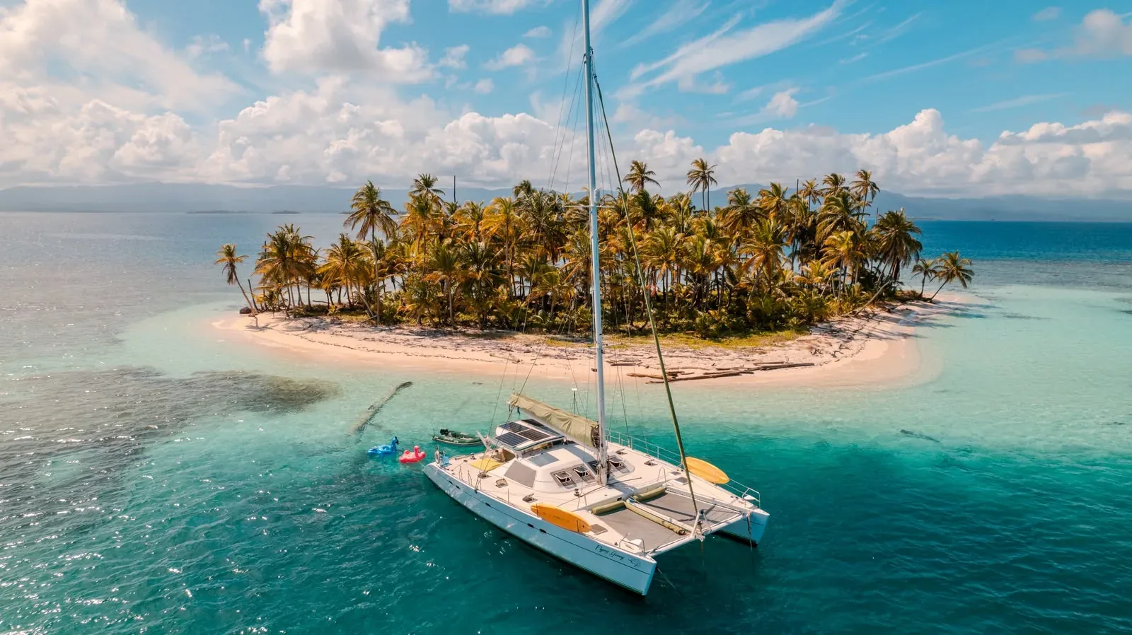 The Lagoon 55 anchored off a small palm island in the San Blas archipelago