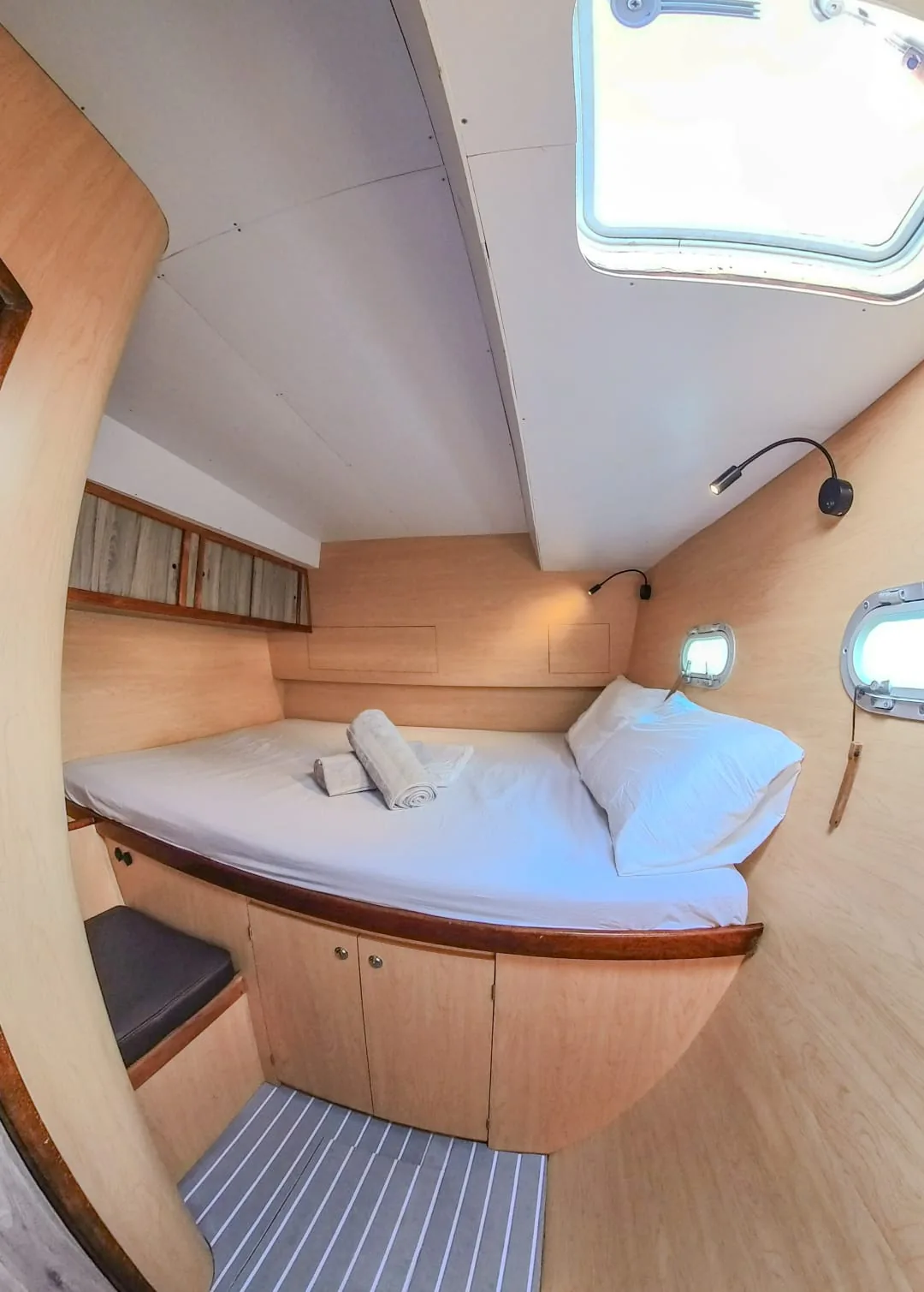 Another double cabin with an overhead hatch and reading lights