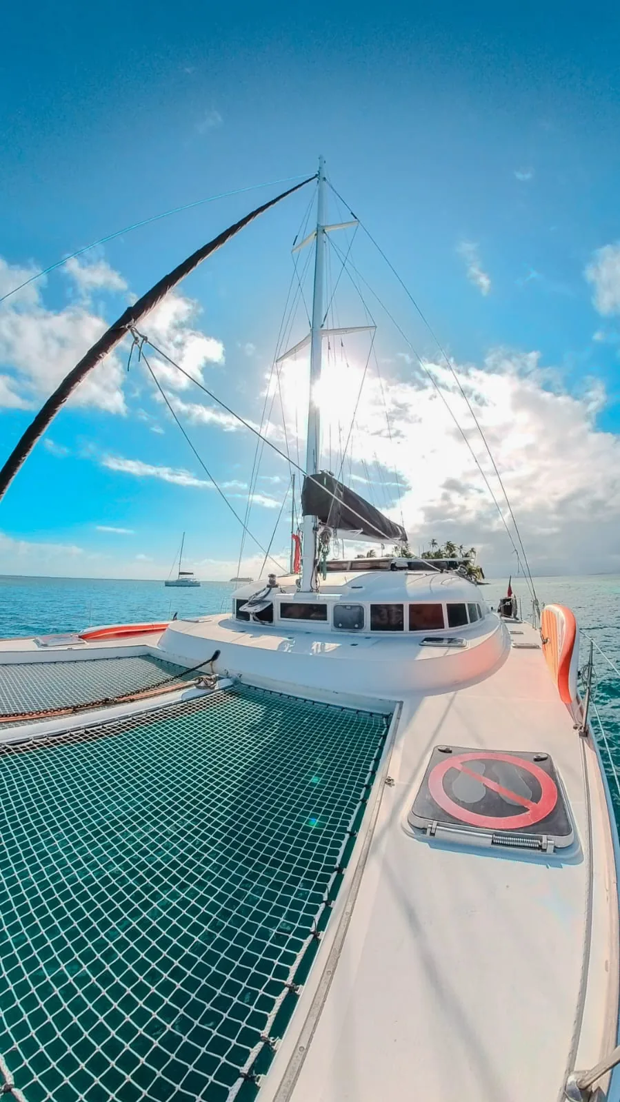 Looking aft over the bow nets towards the mast and cabin top